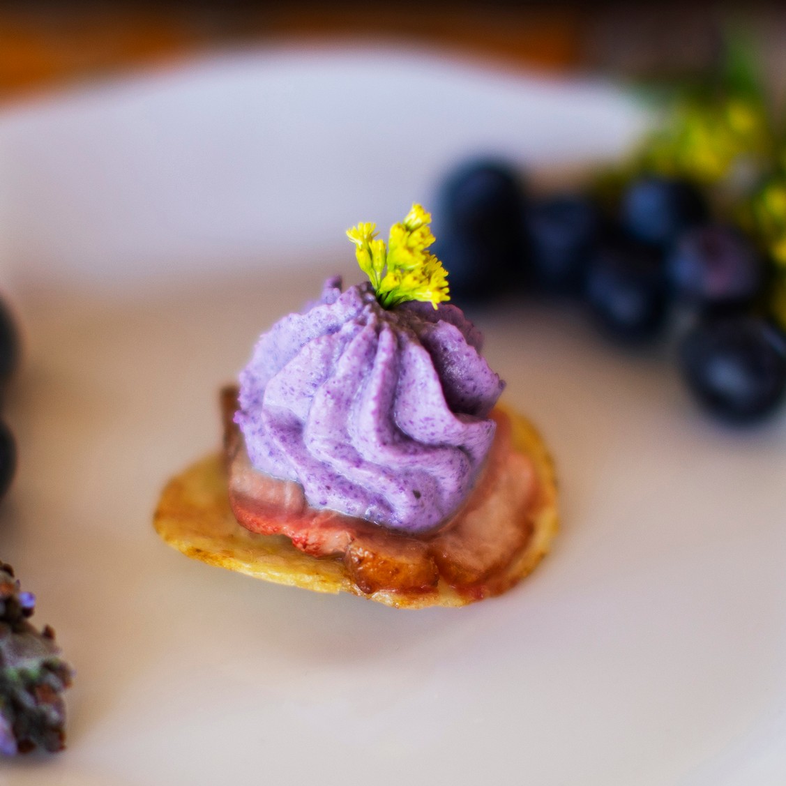 Seared Duck Breast on House-Made Potato Chip with Purple Cauliflower & Lavender Puree
