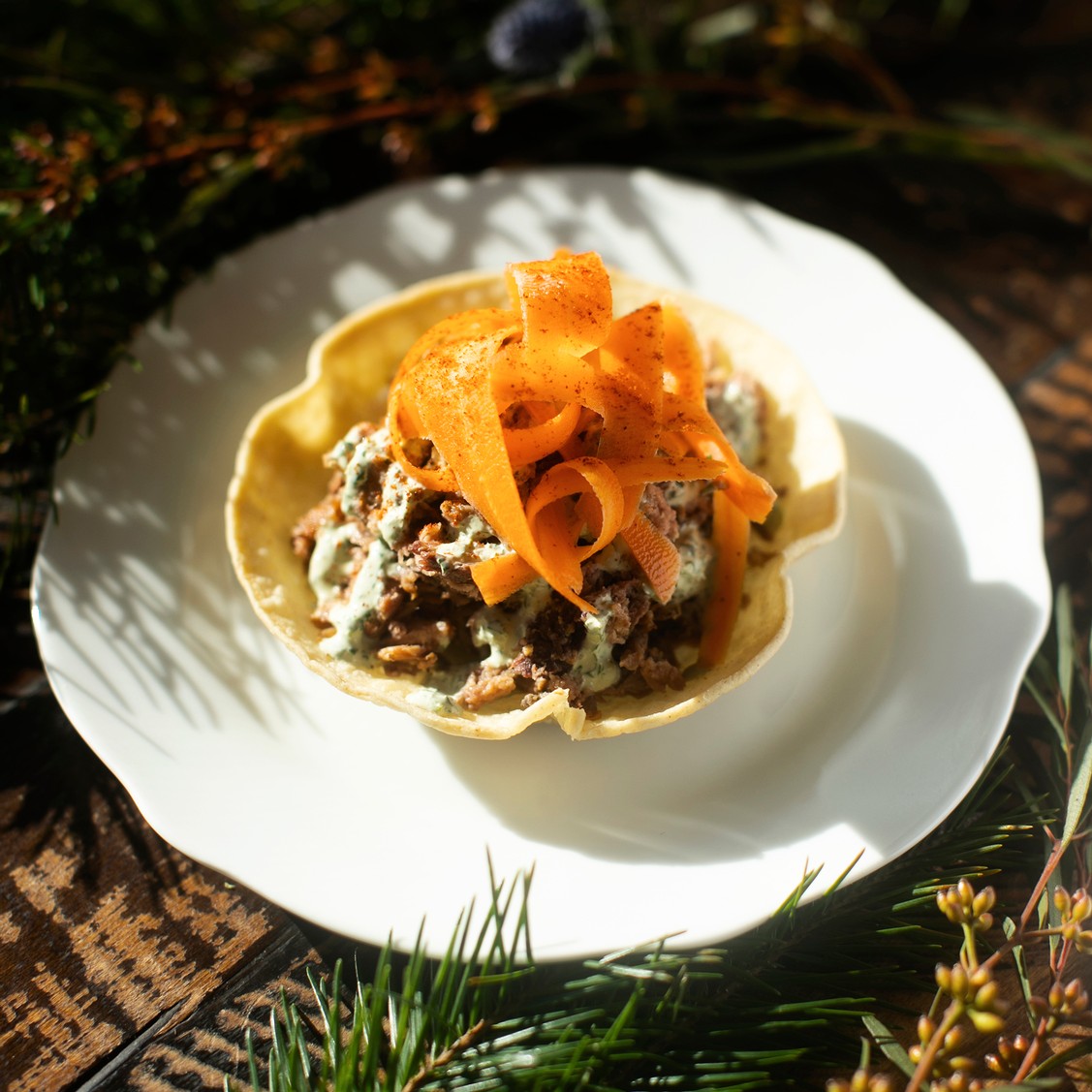 Carnitas Tostada with Carrot & Cilantro-Lime Crema